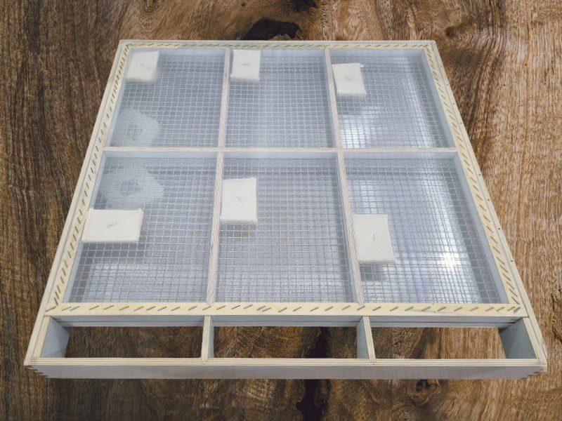 Cotton sieve cleaners installed in a plansifter frame
